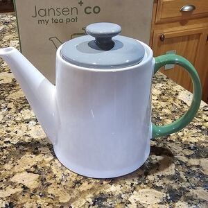 White Teapot with Gray Lid and Green Handle